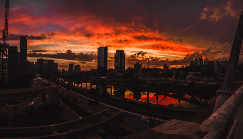 water, landscape, nature, outdoors, landmark, scenic, urban skyline, bridge, dusk, lights, backlit, cityscape, city life, orange color, night, skyline