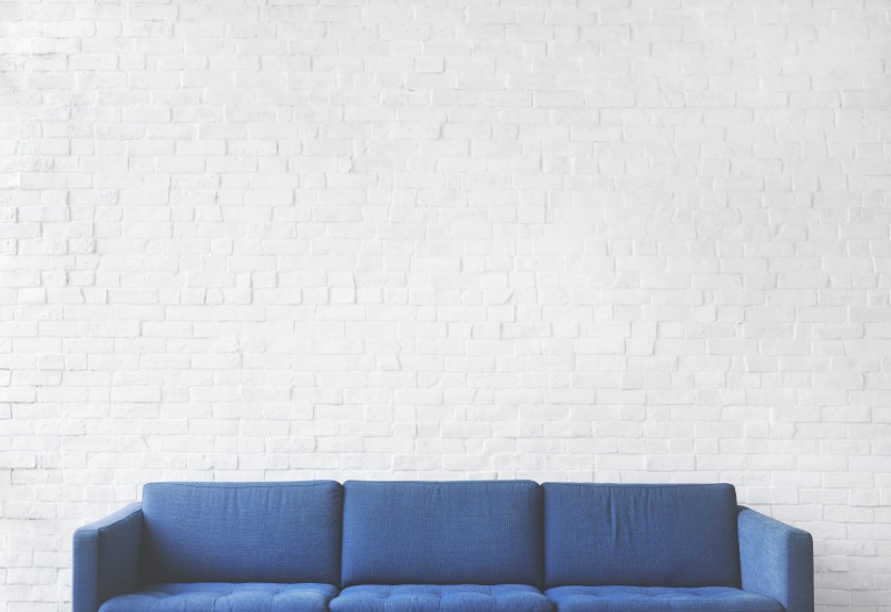couch, interior design, absence, furniture, brick wall, domestic room, simple, 4K, copy space, indoors, wall, wall - building feature, still life, inside