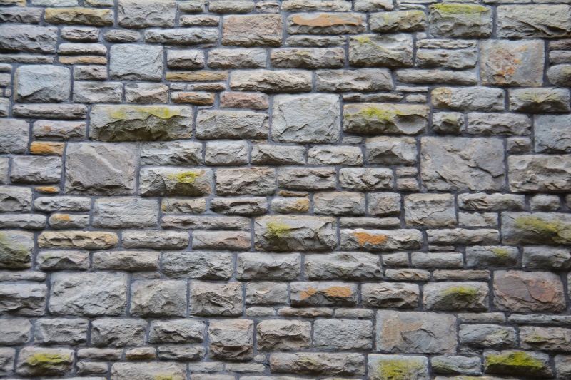 historic, rough, wall - Building Feature, pattern, large group of objects, gray, backgrounds, exterior, welsh, old, brick, welsh wall, material, wall, in a row