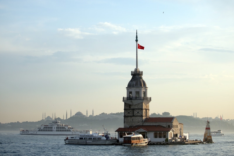 vacation, flag, travel destinations, building exterior, sky, bosphorus, building, istanbul, maiden tower, 4K, passenger craft, strait, turkey, sea, leandrou tower