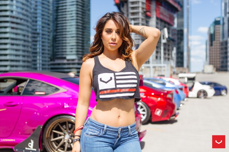 real people, women outdoors, hands on head, brunette, model, motor vehicle, young women, hairstyle, city, architecture, outdoors, three quarter length