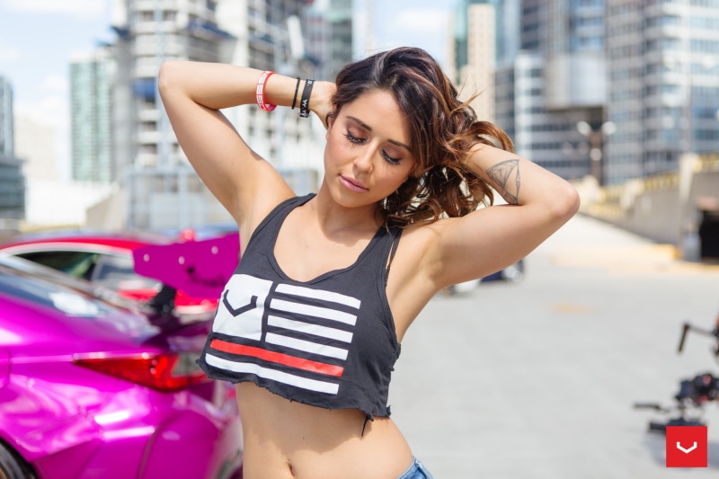 model, tattoo, beauty, beautiful woman, outdoors, jeans, fashion, car, hands on head, depth of field, T-shirt, front view, Tianna Gregory, architecture