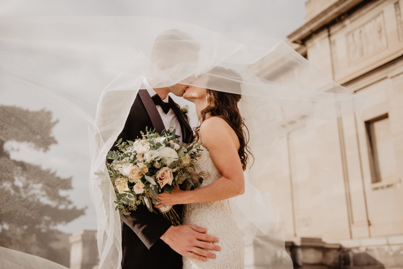 love, flowering plant, event, togetherness, outdoors, day, nature, wedding dress, adult, young women, kissing, young adult, wedding, Bride and Groom, real people