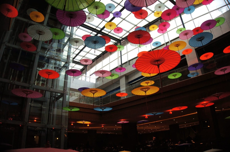 light, multi colored, Japanese umbrella, lighting equipment, low angle view, indoors, ceiling, retail, architecture, illuminated, night, pattern, Asian architecture