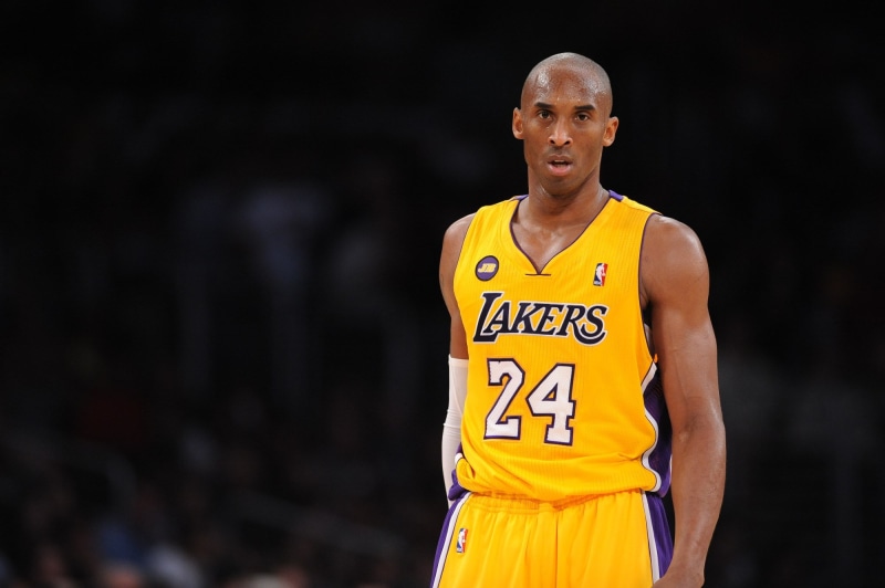 black background, healthy lifestyle, kobe bryant   and screensavers, sports clothing, shaved head, confidence, 1080P, portrait, basketball uniform, clothing