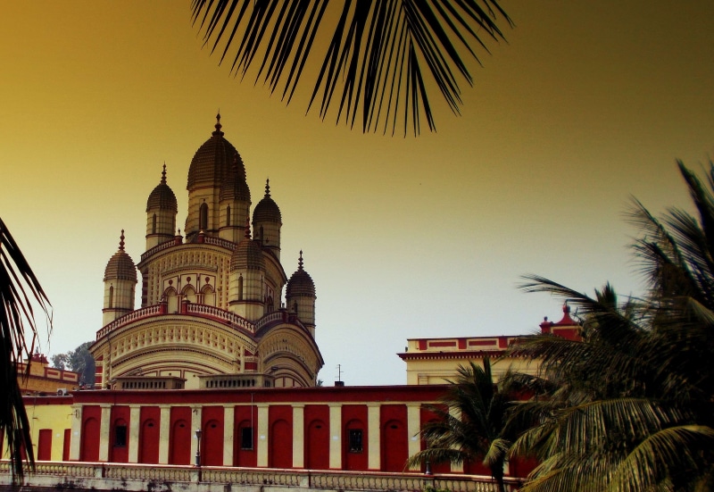 city, religion, palm tree, sunset, dome, nature, outdoors, temple, spirituality, india, coconut palm tree, sky, built structure, palm leaf, travel, building