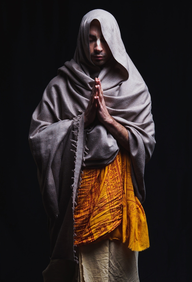 2K, spiritual, front view, brahmachari, puja, traditional clothing, sadness, st, adult, clothing, worship, belief, black background, india, scarf, one person