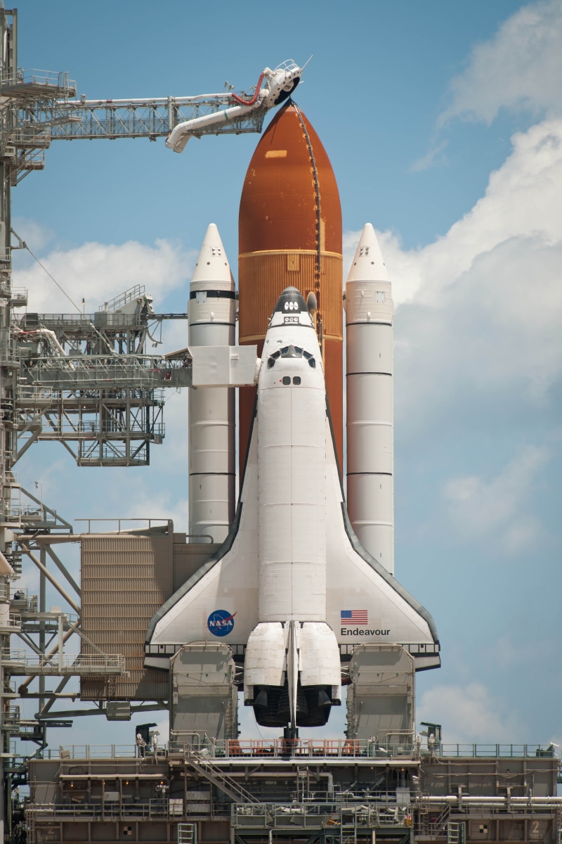 cloud - sky, nature, preparation, outdoors, metal, travel, no people, space shuttle, brown, airplane, astronaut, building exterior, shuttle, transportation