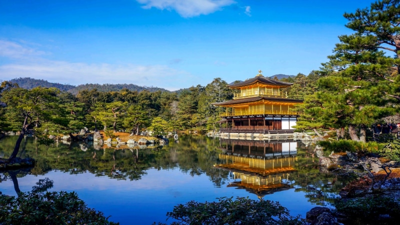 building exterior, blue sky, kyoto, no people, buddhist temple, historic site, 4K, pavilion, spirituality, tree, lake, waterfront, architecture, buddhist