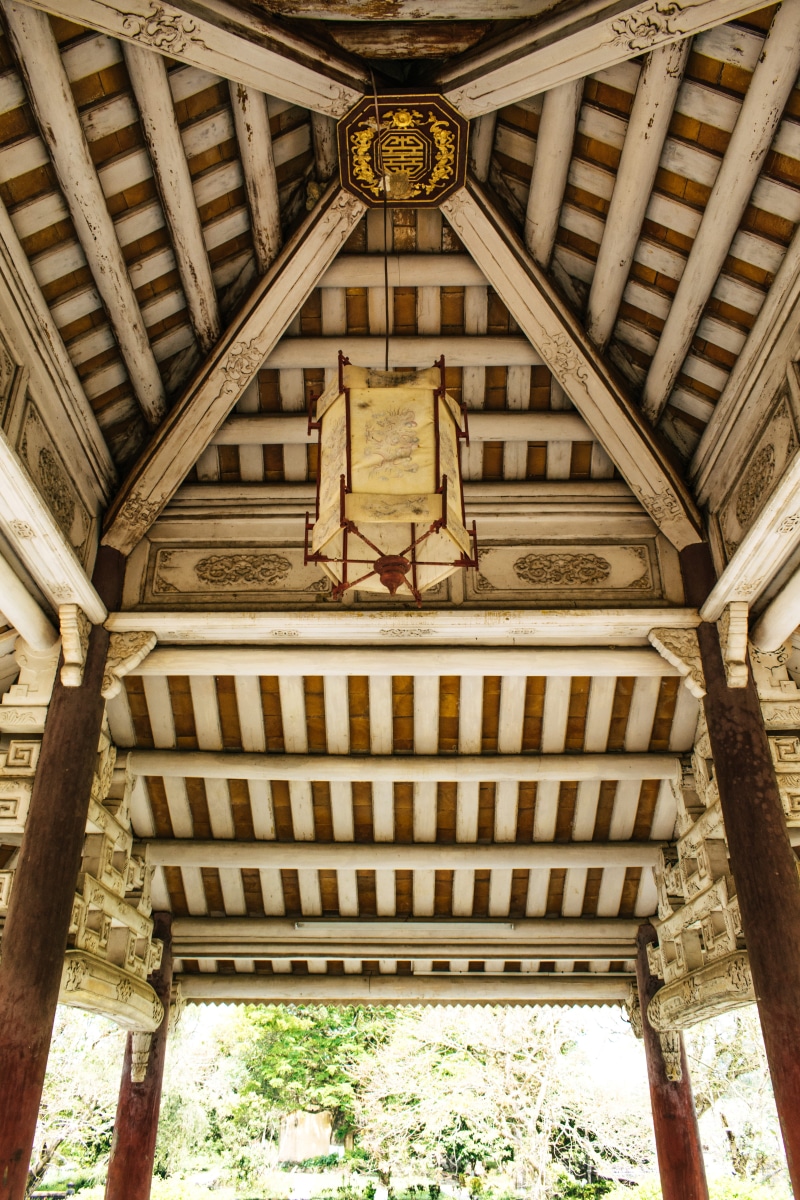 lamp, house, roof, roof beam, no people, low angle view, outdoors, hue vietnam, the past, hue, building exterior, imperial city, ceiling, abandoned, architectural