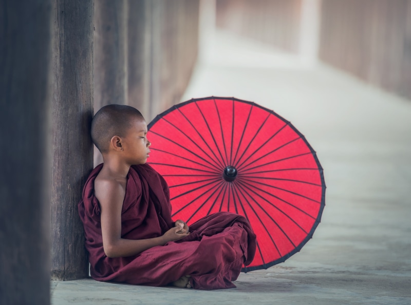 meditate, real people, one person, Dharma, red, religion, boys, visit, Travel, Vacation, Tradition, Practices, sitting, focus on foreground, Umbrella, tourism
