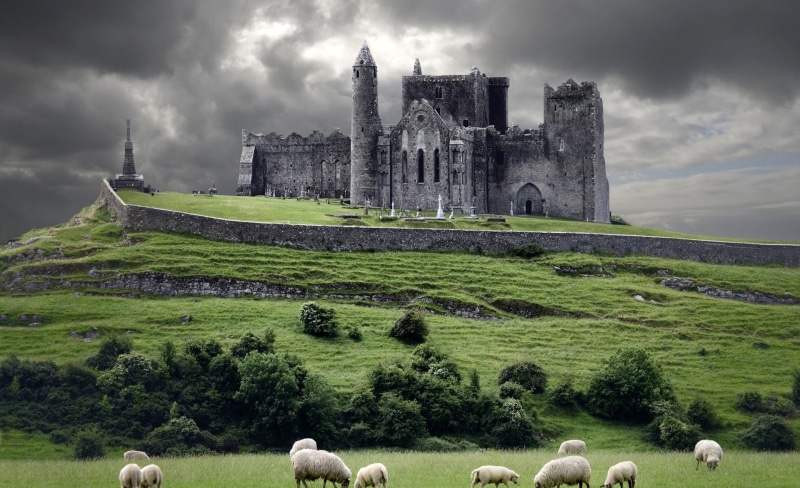 built structure, sky, ancient, castle, grass, plant, domestic animals, animal themes, travel destinations, architecture, Rock, history, cloud - sky, land
