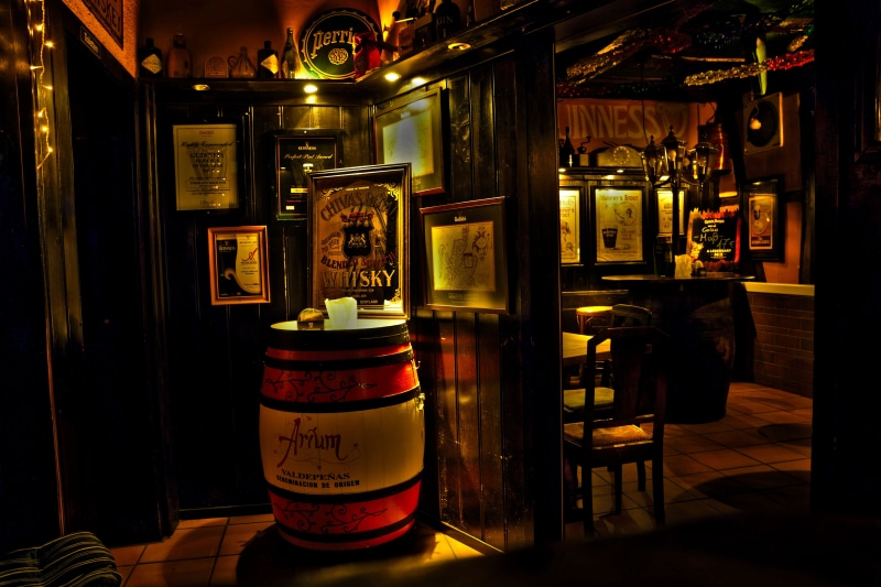 illuminated, guinness, bottle, still life, drink, pub, brown, architecture, container, night, western script, whiskey, barrel, no people, bar - drink establishment