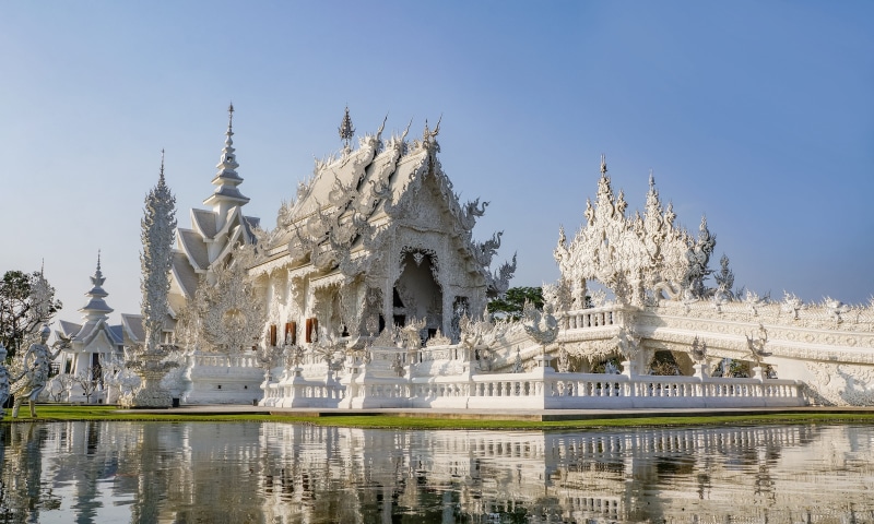 painted, travel destinations, temple, religion, tower, built structure, body of water, building exterior, worship, winter, plant, spirituality, famous