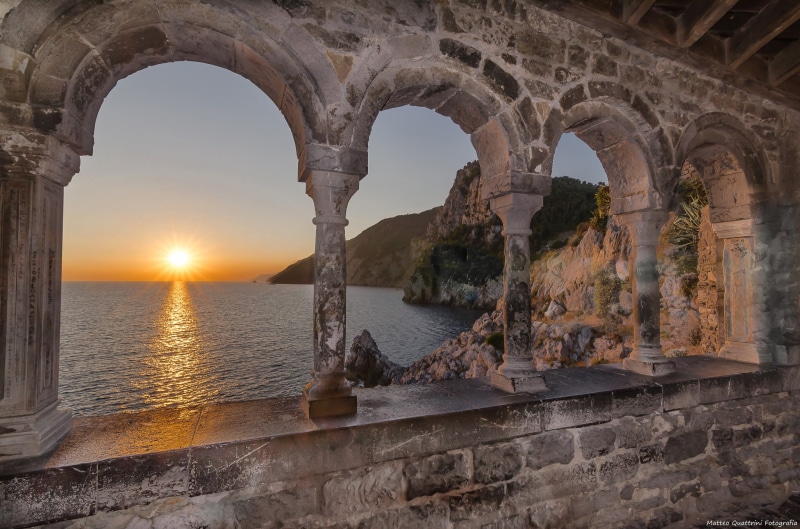 sunlight, cliff, landscape, scenics - nature, Italy, built structure, arched, architectural column, water, architecture, lens flare, concrete, sky, reflection