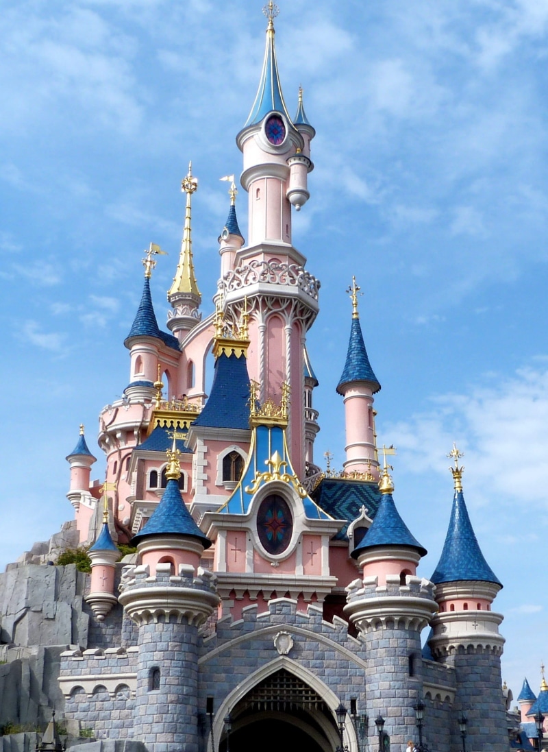 ornate, magic kingdom, castle, travel destinations, building exterior, spire, low angle view, sky, paris, disneyland, architecture, place of worship, sleeping beauty castle
