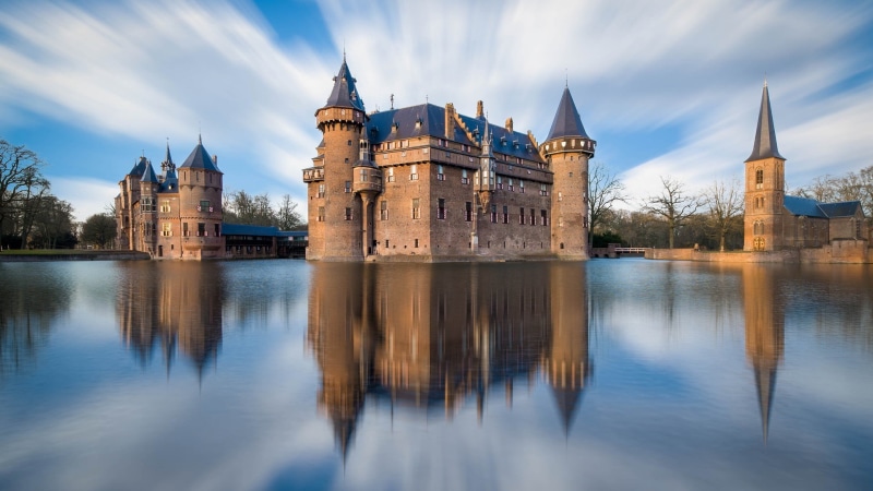 city, waterfront, landscape, sky, long exposure, bridge, no people, trees, nature, building exterior, tower, history, spire, clouds, blue, building, government