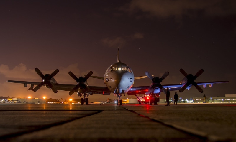 flight line, motion, travel, commercial airplane, mode of transportation, dusk, freight transportation, runway, lights, p-3c orion, maintenance, aviation