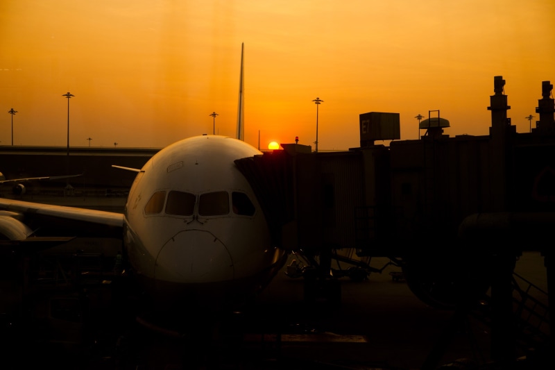 aerospace industry, sun, dawn, airplane, backlit, city, aircraft, airport terminal, dusk, flight, silhouette, passenger boarding bridge, mode of transportation