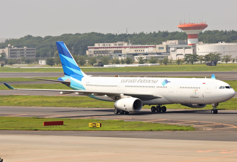 Airbus 330, indonesia, manchester - England, airplane, Garuda Indonesia, sky, A330, editorial, 4K, landing - Touching Down, people Traveling, PK, business