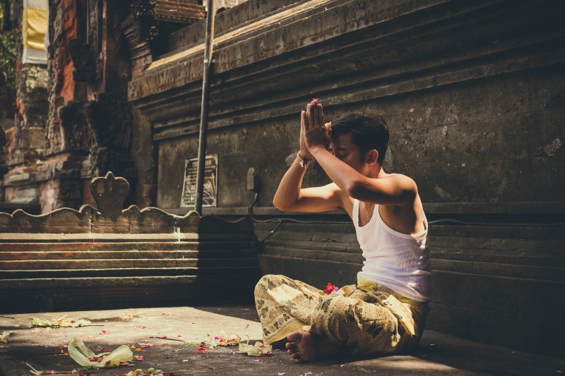 ritual, young men, day, religious, wearing, holding, belief, top, indonesia, praying, full length, tank, real people, white, casual clothing, man, person