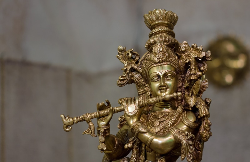 metal, tilt, close-up, india, krishna, figure, lord krishna, sculpture, shift, sacred, 2K, religion, creativity, lens, focus on foreground, representation