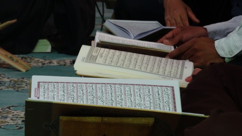 masjid, place of worship, midsection, holding, paper, adult, muslim, holy, 5K, quran, spirituality, human body part, person, people, publication, islam book
