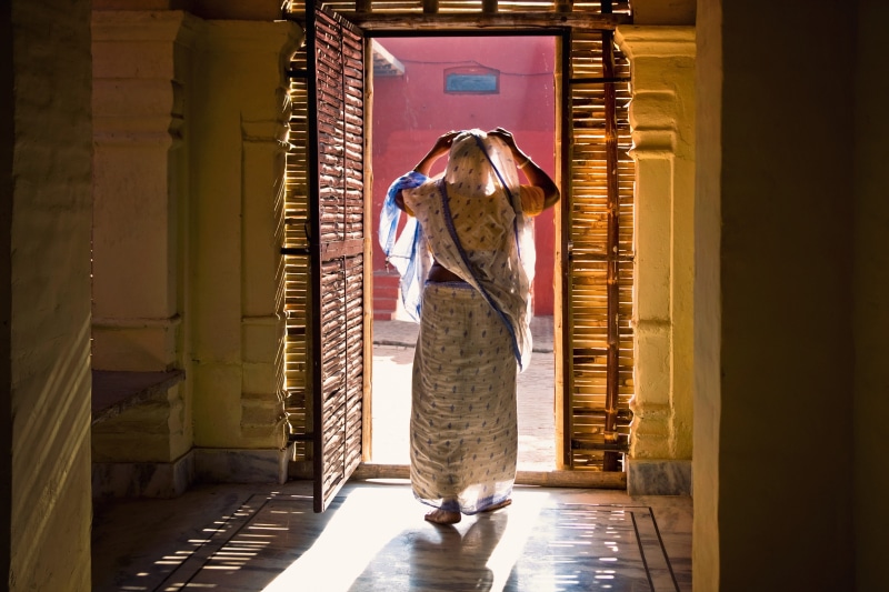 adult, sunlight, day, faith, entrance, full length, looking, light, walk, 4K, travel, hole, indian, vaishnava, real people, doorway, vrindavan, side view