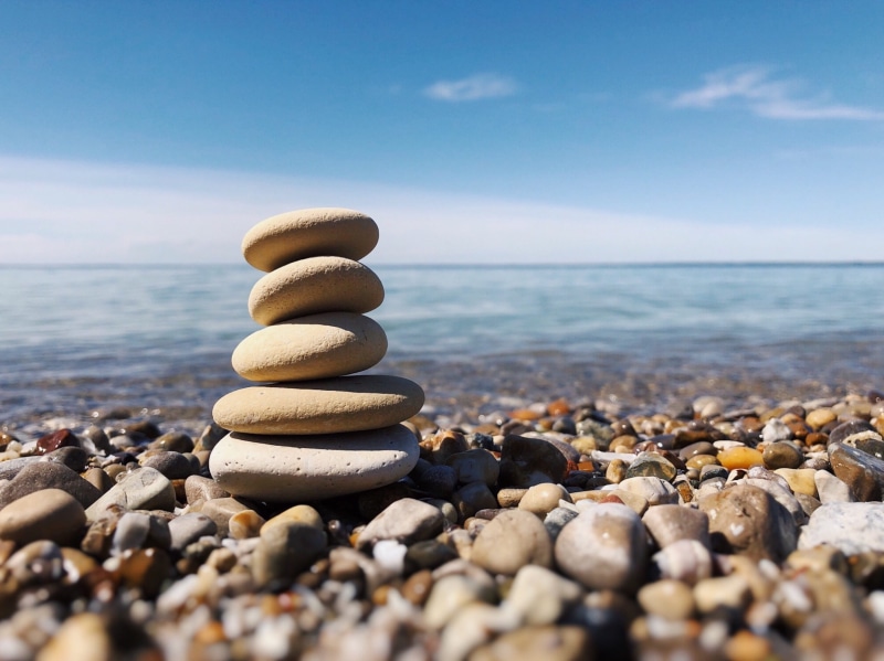 horizon over water, no people, beauty in nature, stone, tranquil, solid, 2K, water, stacked, pebble, sky, outdoors, tranquil scene, stone - object, rock balance