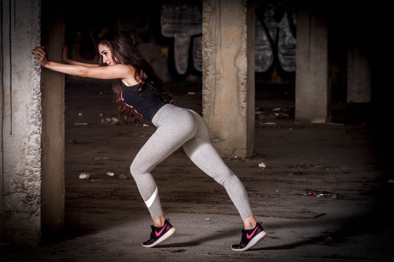 hairstyle, leggings, long hair, s, yoga pants, architecture, Nike, beautiful woman, full length, fashion, standing, portrait, legs, one person, human limb