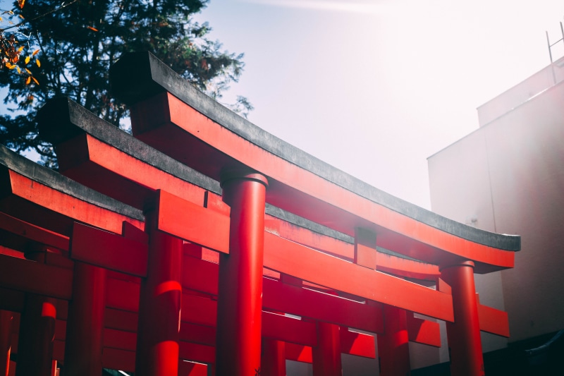 clear sky, red, town, japan, gate, gates, building exterior, column, urban, in a row, seat, train, railing, nature, building, plant, absence, religion