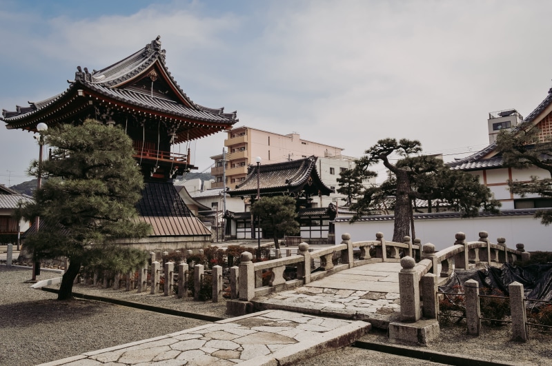 religion, pagoda, wood, the past, architecture, spirituality, city, building exterior, metropolis, place of worship, day, pillar, worship, surrounded, person