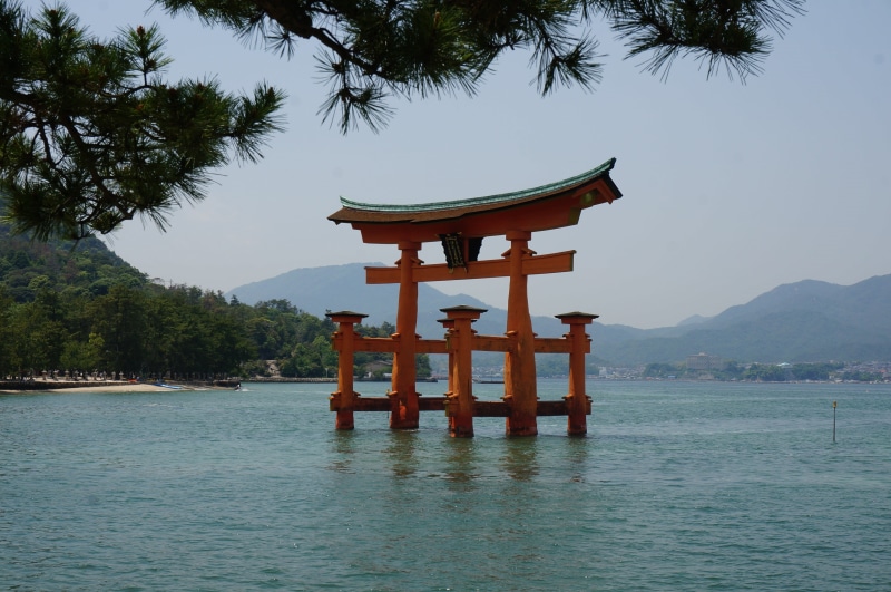 mountain range, outdoors, tranquility, itsukushima shinto shrine, water, mountain, tree, sky, miyajima, shrine, travel destinations, spirituality, scenics - nature