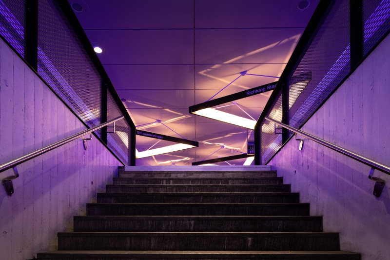 stairs, architecture, banister, illuminated, building, subway station, stage, black, lighting, purple, staircase, built structure, modern, low angle view