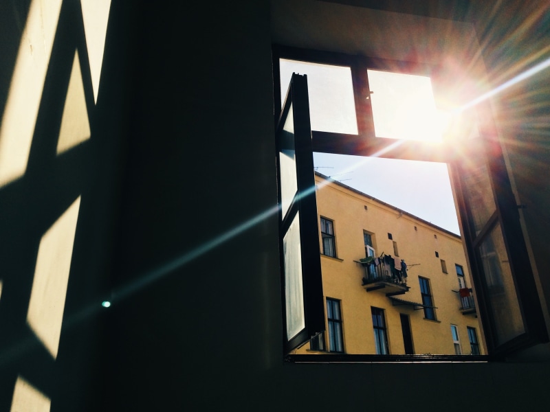 window, windows, spirituality, neon, sun, headlight, bright, lens flare, light, banister, opened, religion, sign, outdoors, architecture, sunbeam, day