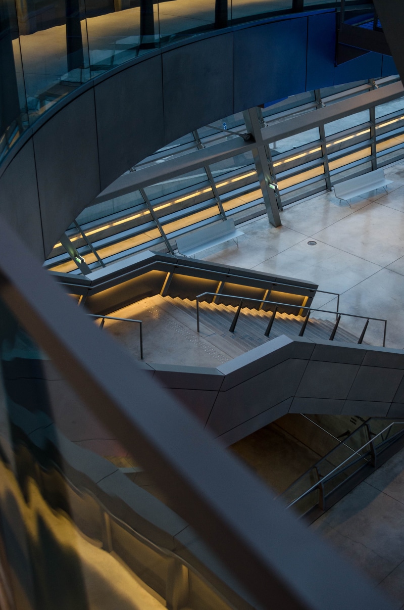 glass - material, high angle view, wall - building feature, pedestrian, window, glass, museum, day, interior design, framed, lyon, metal, outdoors, futuristic design