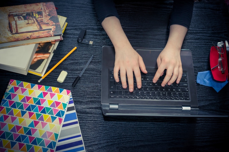 wood, laptop, memory stick, books, wooden desk, cleaner, handwriting, wireless technology, notebook, student, school, one person, girl, learn, knowledge