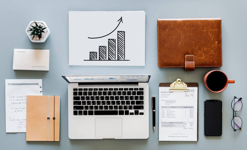desk, furniture, financial, bankbook, indoors, nobody, table, mug, portable information device, mobile phone, wireless technology, cup, no people, technology