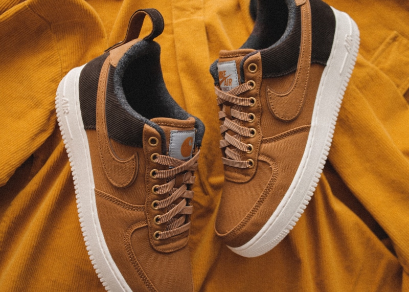 high angle view, air force 1, carhartt, canvas, shoe, human, sand, kicks, pair, undershirt, textured, jeans, textile, casual clothing, pattern, retail