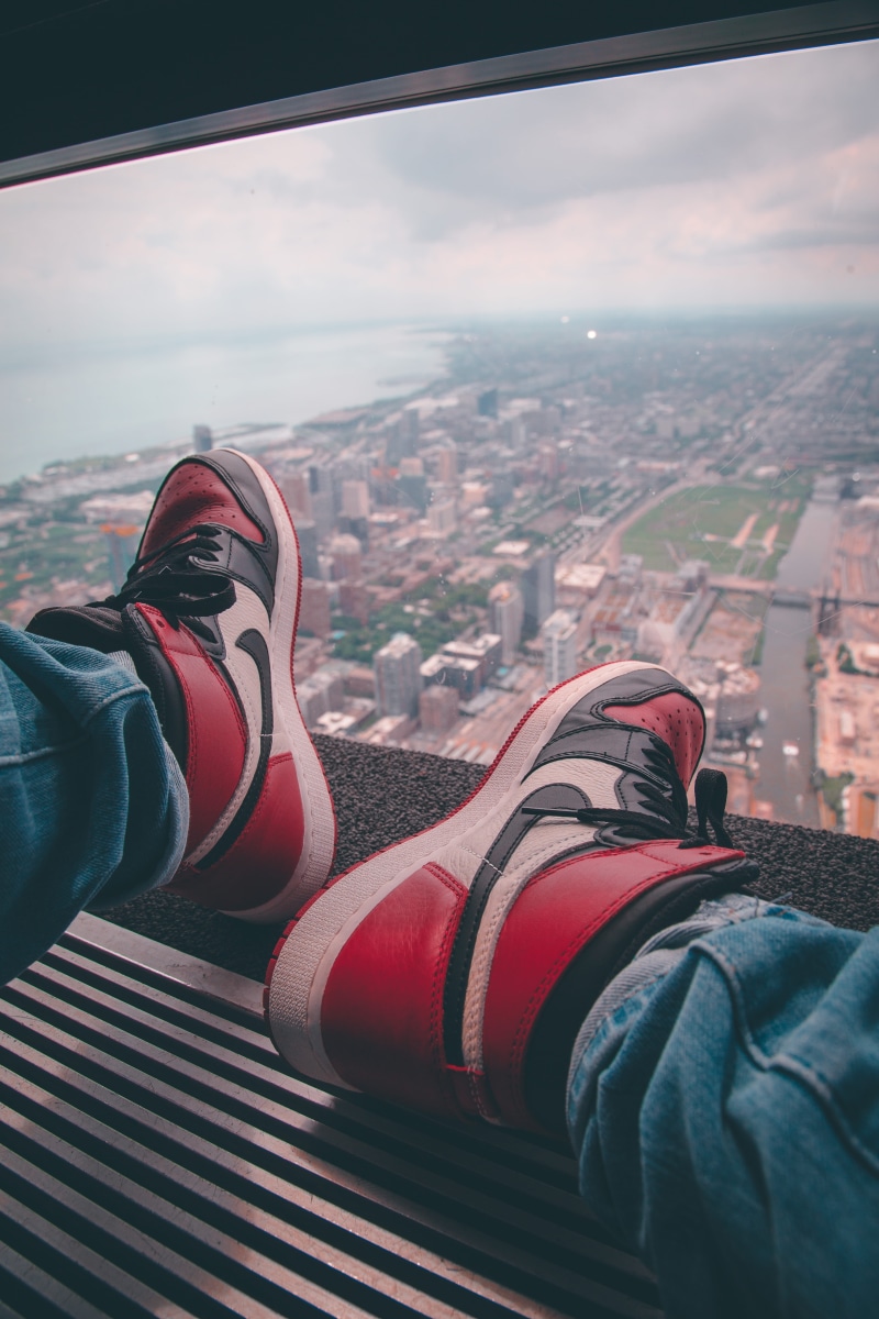 jeans, landscape, photoshoot, air, daylight, city, cityscape, relaxation, modern, human body part, low section, lifestyles, wear, shoes, leisure activity
