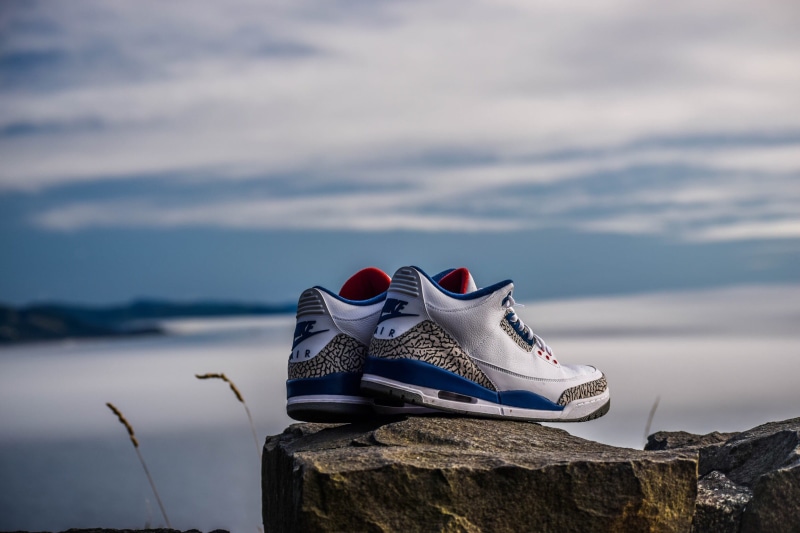 fragment, beach, shoe, focus on foreground, blue, black, jordan, trainers, outdoors, rock, pair, mountain, oregon, rock - object, cloud - sky, water, sneakers
