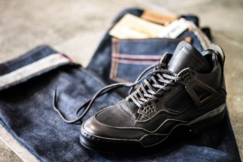 spoke, accessory, pair, tire, jeans, close-up, no people, personal accessory, textile, indoors, suede, fashion, bag, jordan, black color, pants, shoelace