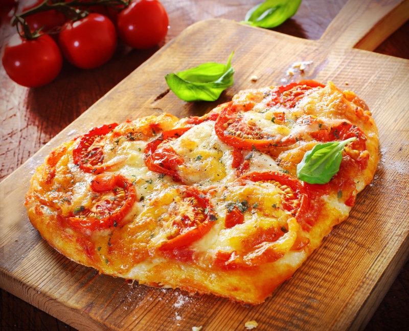 cheese, food and drink, baked, wood - material, basil, heart, take out food, homemade, tomato sauce, cutting board, fruit, snack, healthy eating, food
