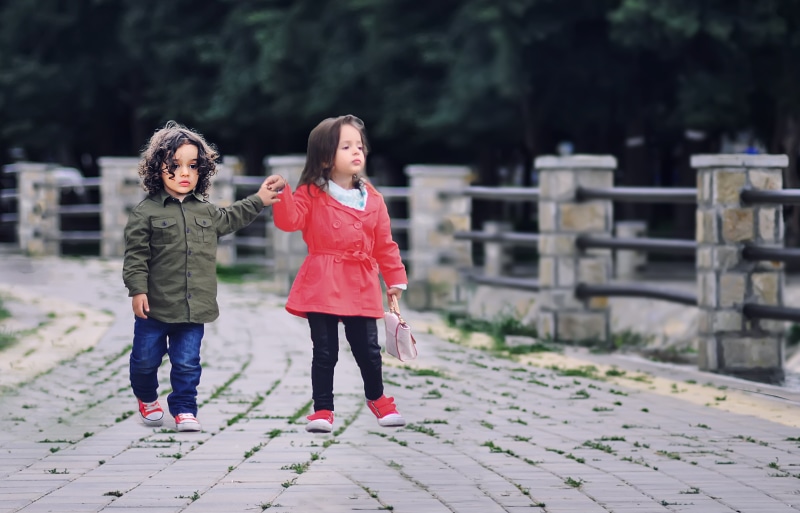 outdoors, front view, glamour, hair, childhood, togetherness, children, real people, elegance, leisure activity, little, child, day, females, warm clothing