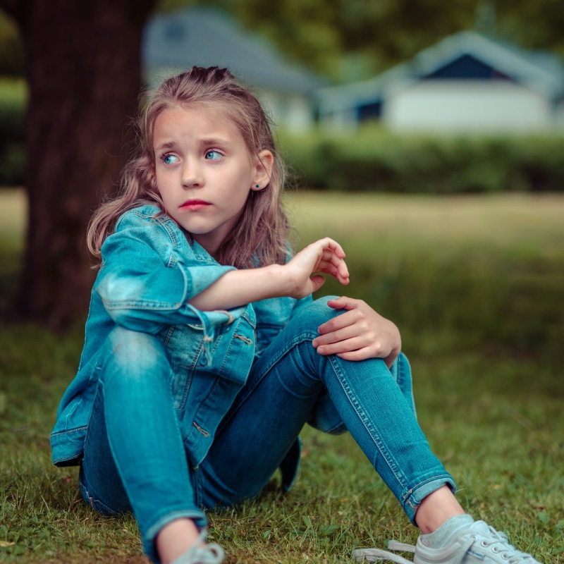 looking at camera, babies And Children, jacket, field, tree, casual Clothing, women, green, selective, children only, day, sitting, females, happiness