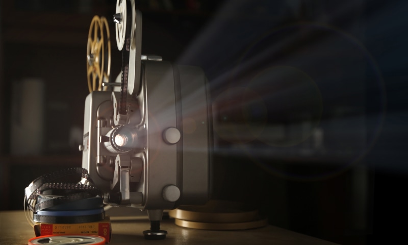 obsolete, the show, movie camera, retro, table, spool, close-up, indoors, macro, bokeh, film industry, camera - photographic equipment, coil, no people