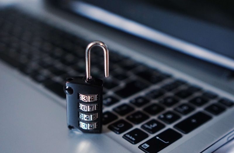 global communications, computer, padlock, business, computer keyboard, laptop, indoors, no people, cyber, wireless technology, busy, theft, computer equipment