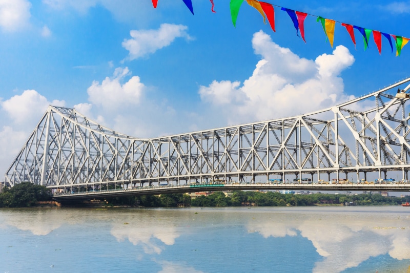 built structure, no people, flag, howrah bridge, calcutta, cloud - sky, connection, bridge - man made structure, travel destinations, sky, india, kolkata