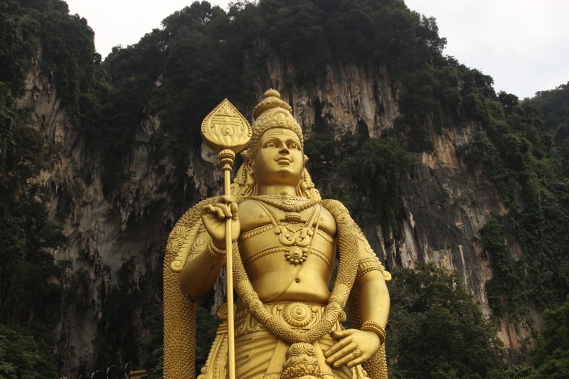 craft, asia, statue, tourism, mountain, plant, place of worship, spirituality, culture, batu caves, belief, lumpur, religion, tree, human representation