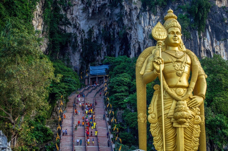 place of worship, outdoors, statue, religion, plant, spirituality, belief, built structure, representation, building, malaysia, 4K, travel, hindu, batu caves